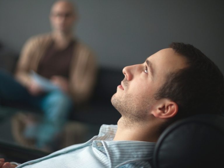 man practicing mindfulness in CBT session