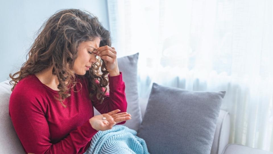 How Long Does It Take to Detox From Alcohol a woman grapples with withdrawal symptoms