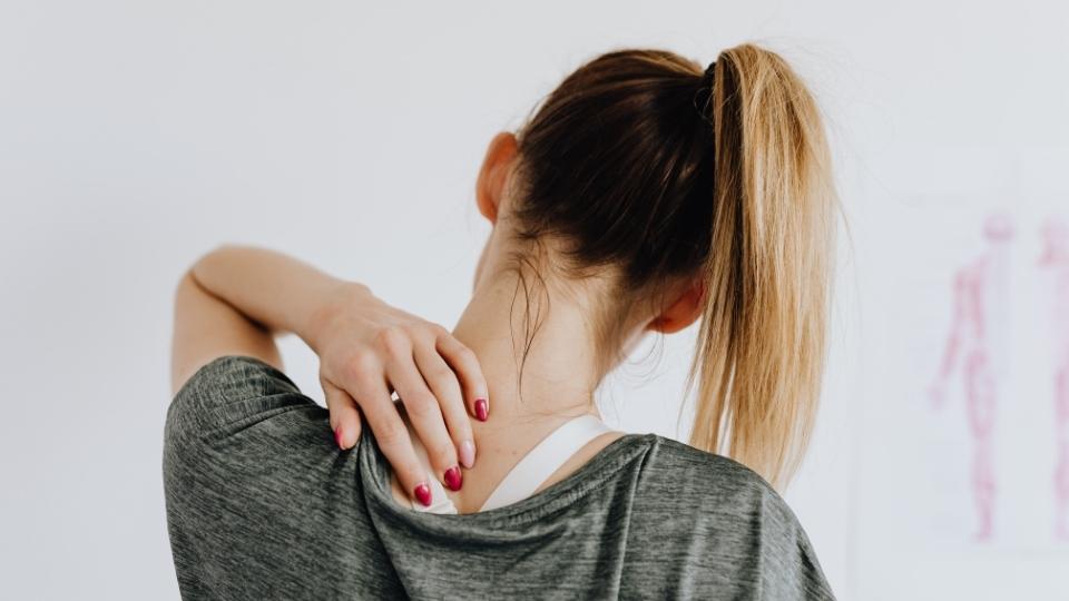 Is Meloxicam a Muscle Relaxer a woman rubs her neck because meloxicam isn't relieves her muscles.
