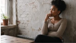 OxyContin vs Oxycodone hero image of a woman thinking about the difference.