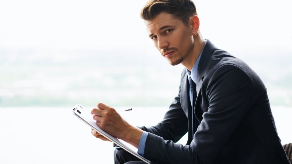 What Is a Single Case Agreement hero image of a man writing on a clipboard.
