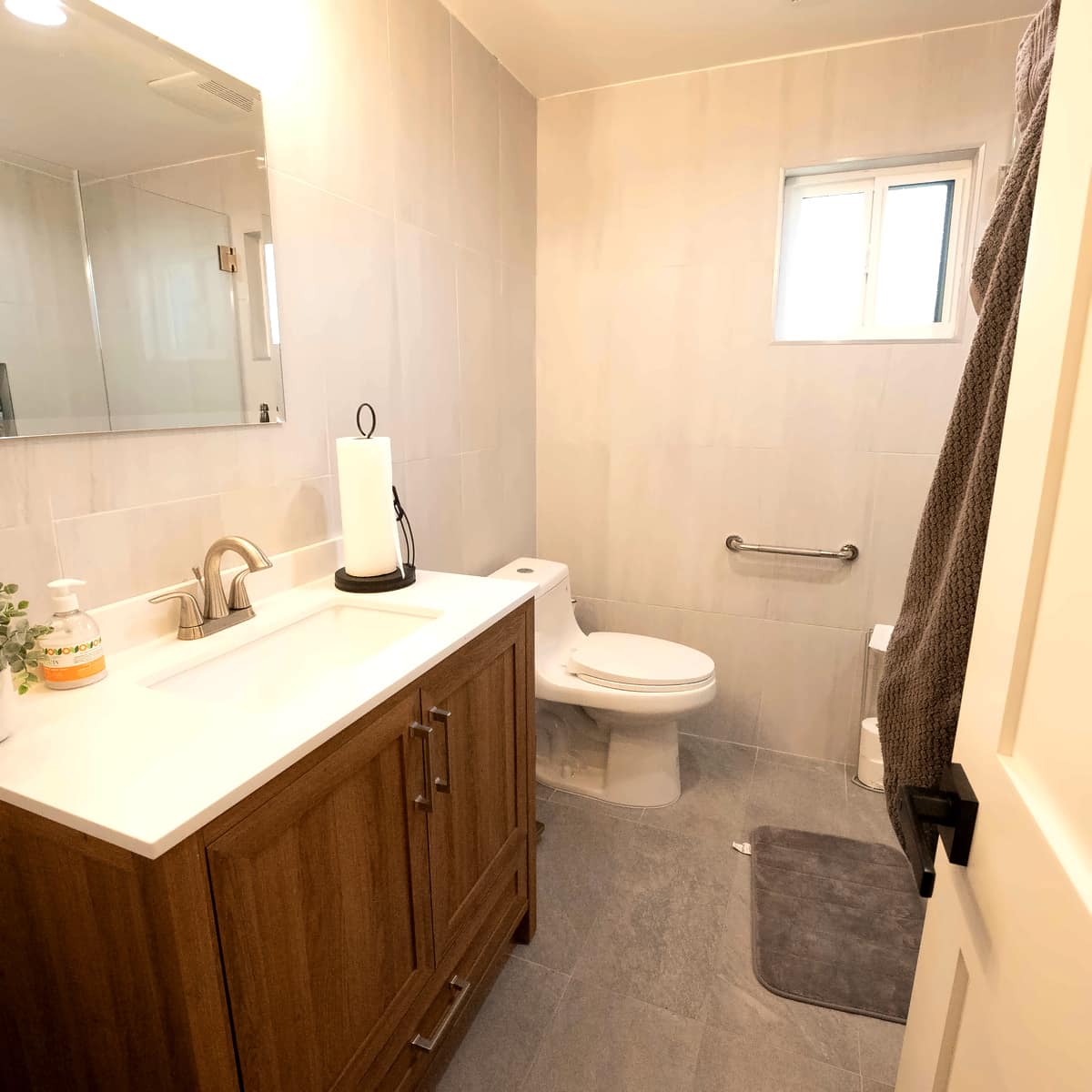 Bright Paths Recovery Bathroom with sink, vanity and shower