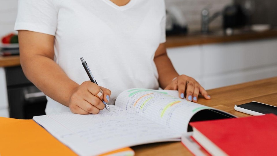 Family member writing an impact letter to prepare for an intervention